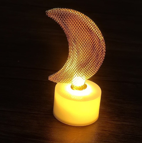 Copper crescent moon candle with yellow light