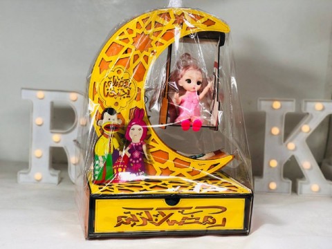 Wooden lantern in the shape of a crescent moon with a drawer