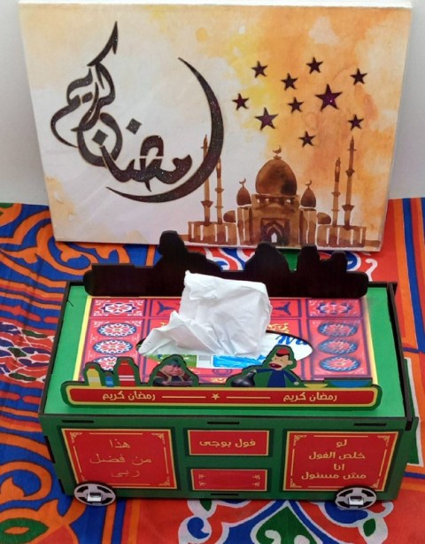 Tissue box in the shape of a bean cart
